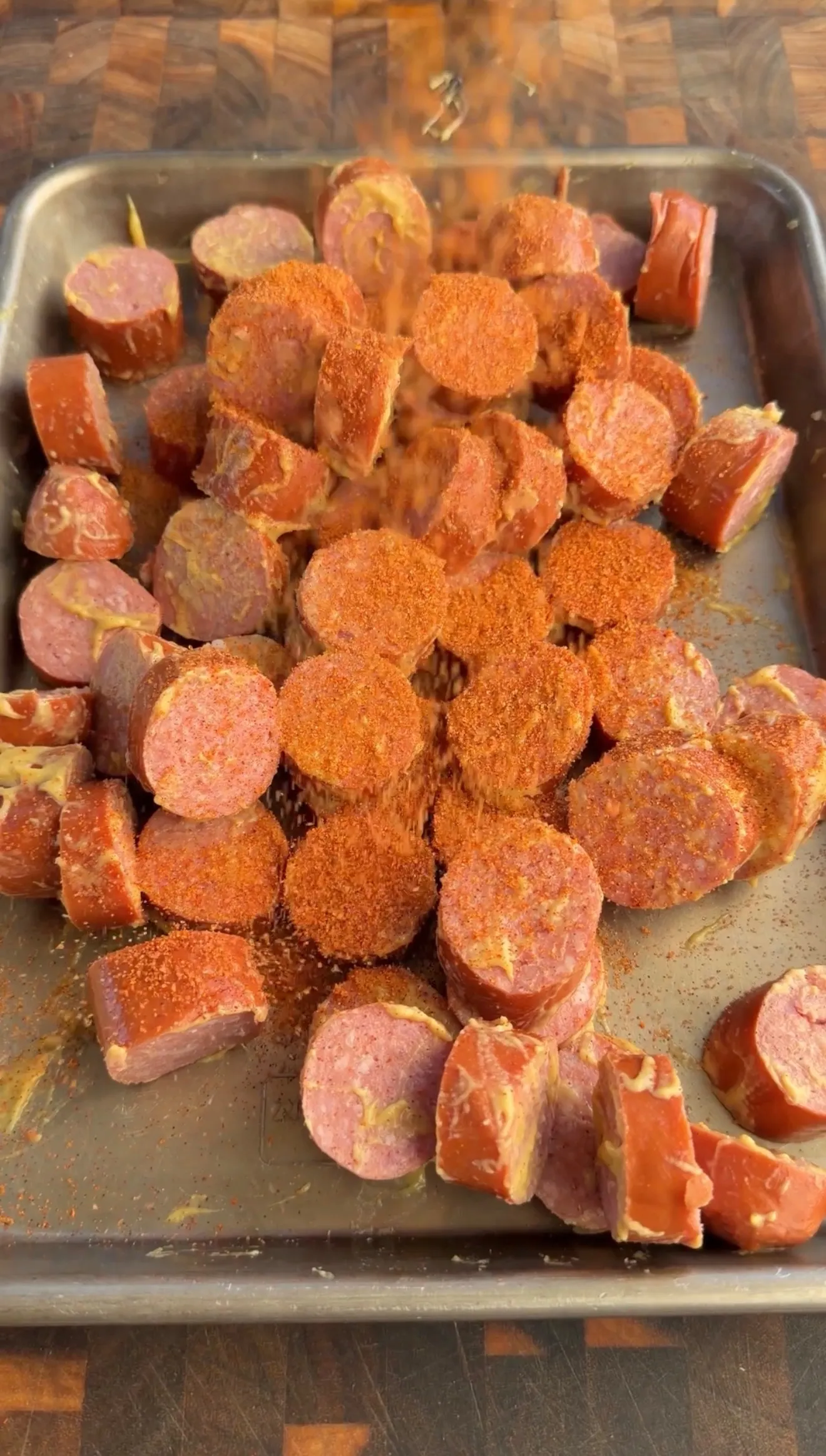 Seasoned sausage burnt ends on baking sheet