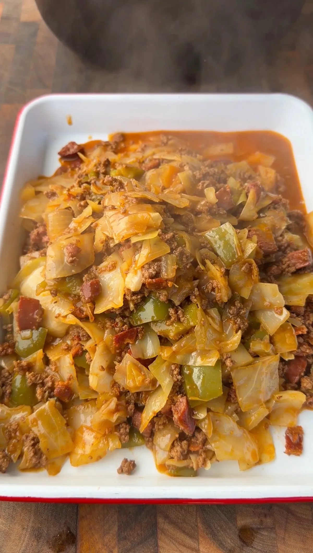 Viral Dirty Cabbage with ground chuck, kielbasa, bacon, green bell pepper, and cabbage in Creole-seasoned sauce
